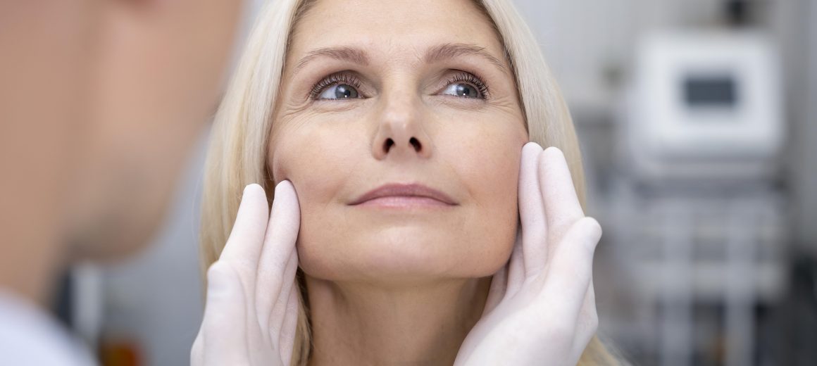 close-up-doctor-checking-smiley-woman